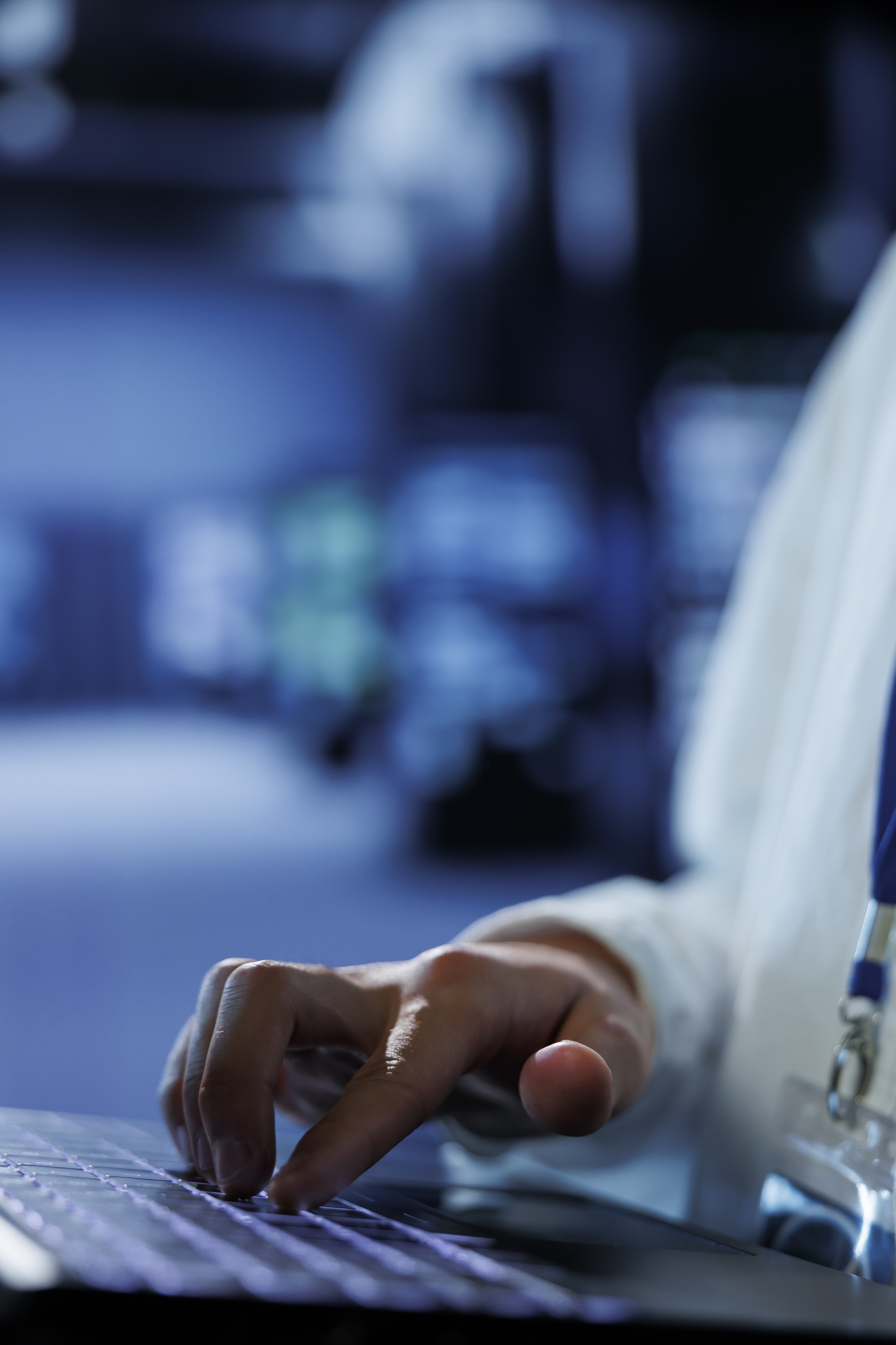 Abstract image of person at computer